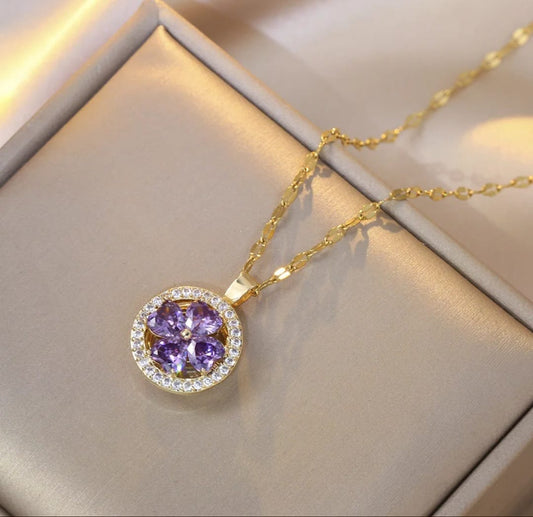 Collar giratorio flor morada Zircon