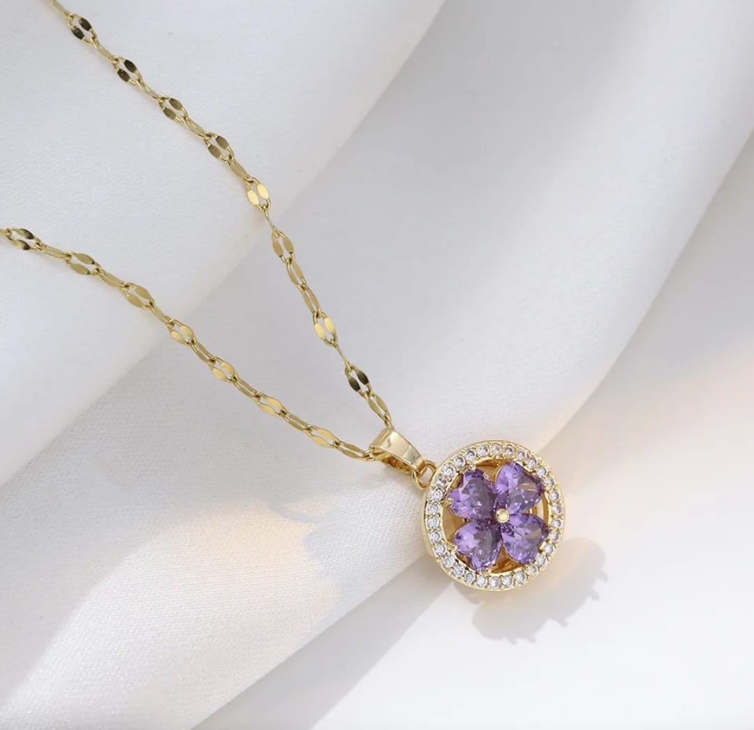 Collar giratorio flor morada Zircon
